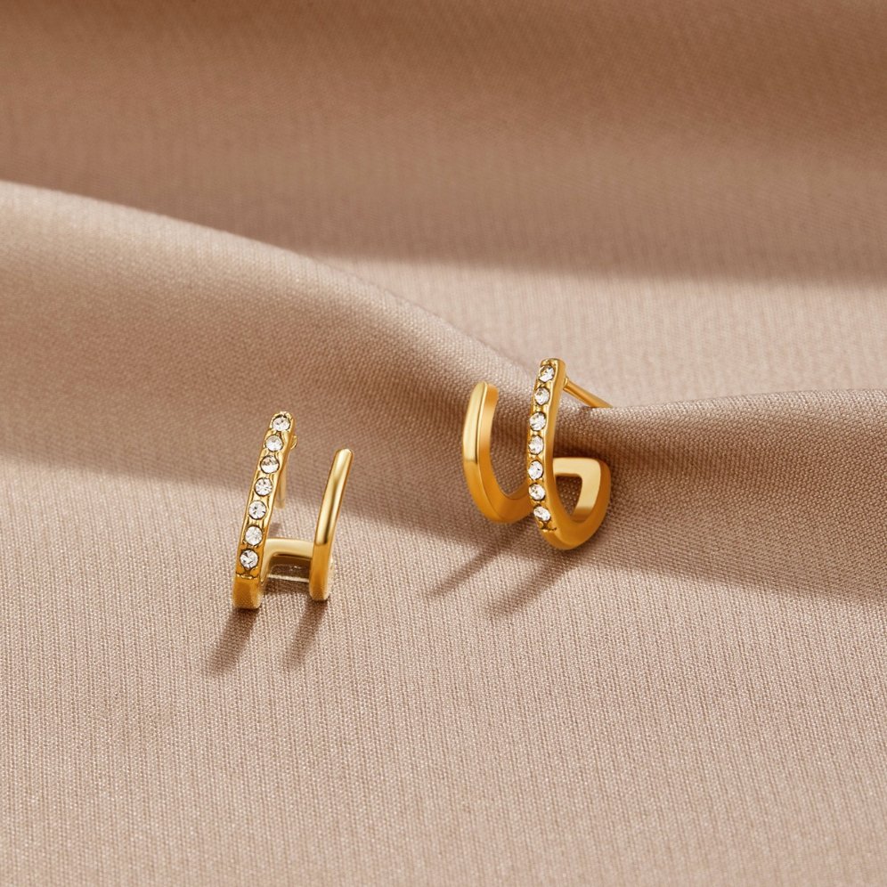 Zendaya – Kristallohrringe in Krallenform aus 18K Gold