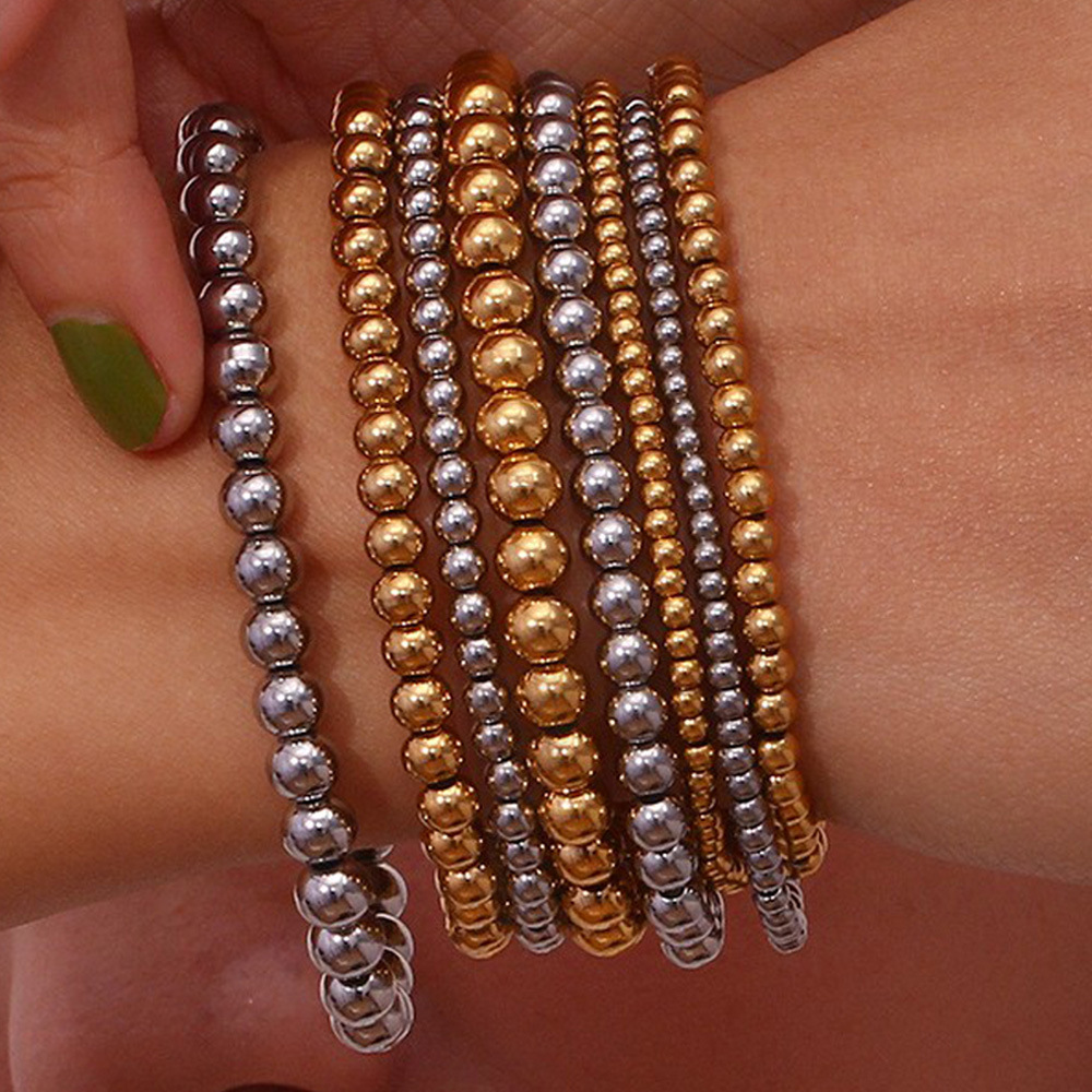 Crea - Stilvolles stapelbares goldenes Metallarmband (4mm)