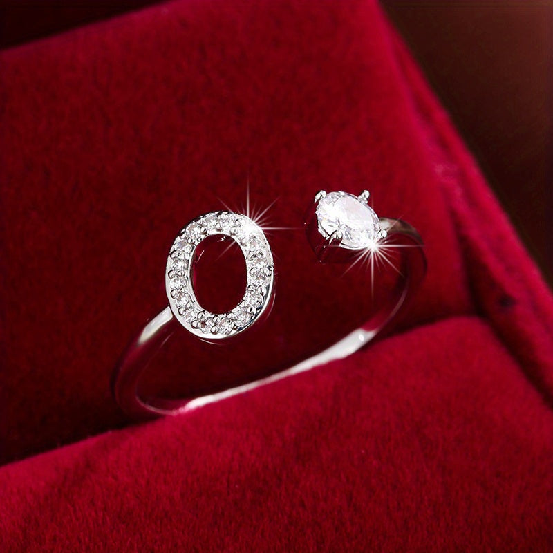 Nova – Moderner offener Ring mit Buchstaben und Zirkonia