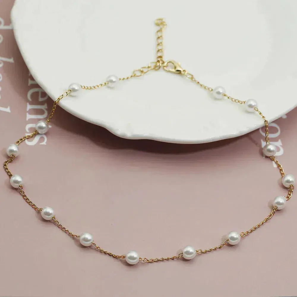 Vivienne – Kette mit goldfarbenen Perlen
