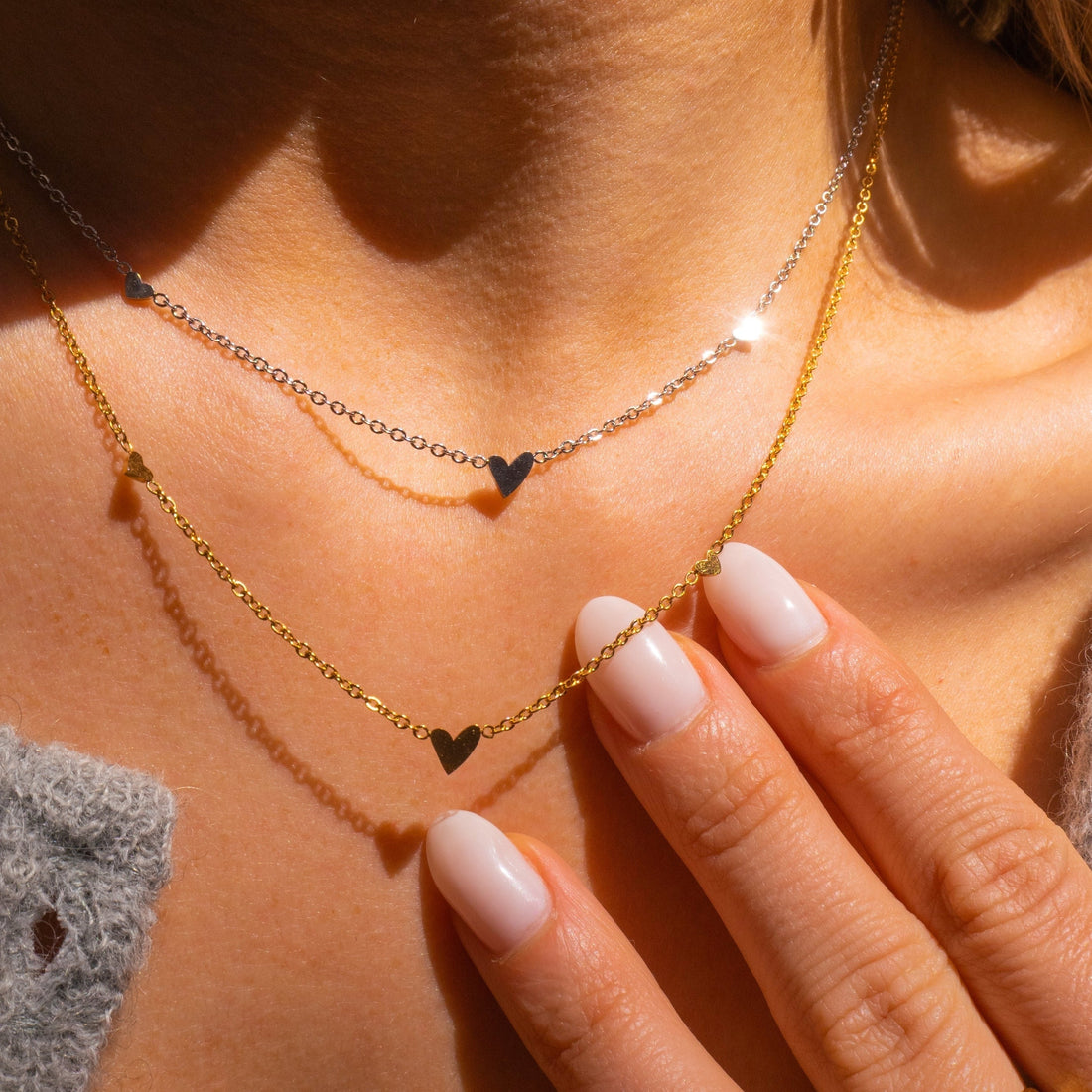 Silberne Kette mit drei Herzen