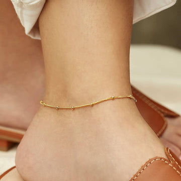 Wren – Stilvolle Goldkette für den Knöchel