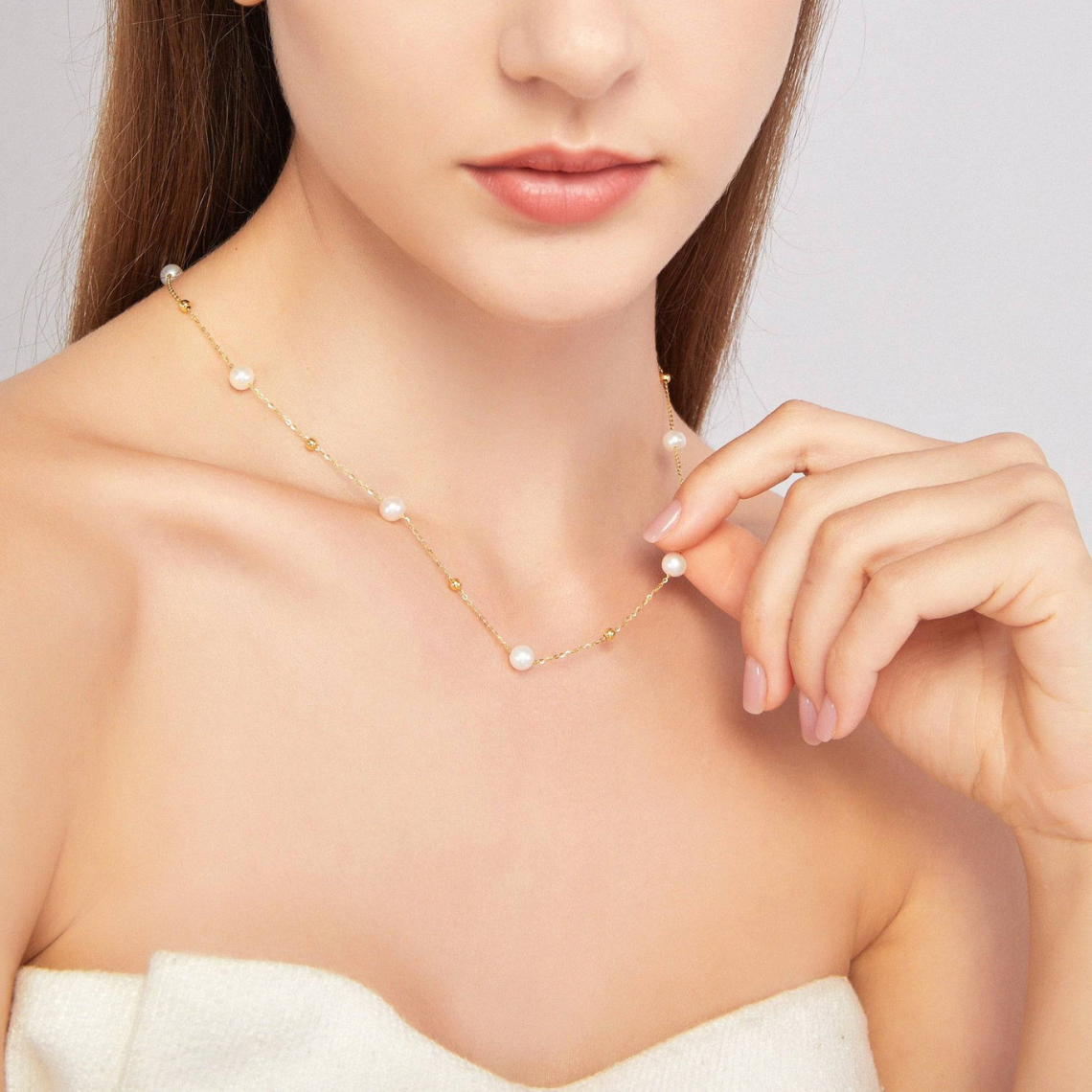 Kette mit Gold und Perlen - abwechselnd Perlen und Goldglieder