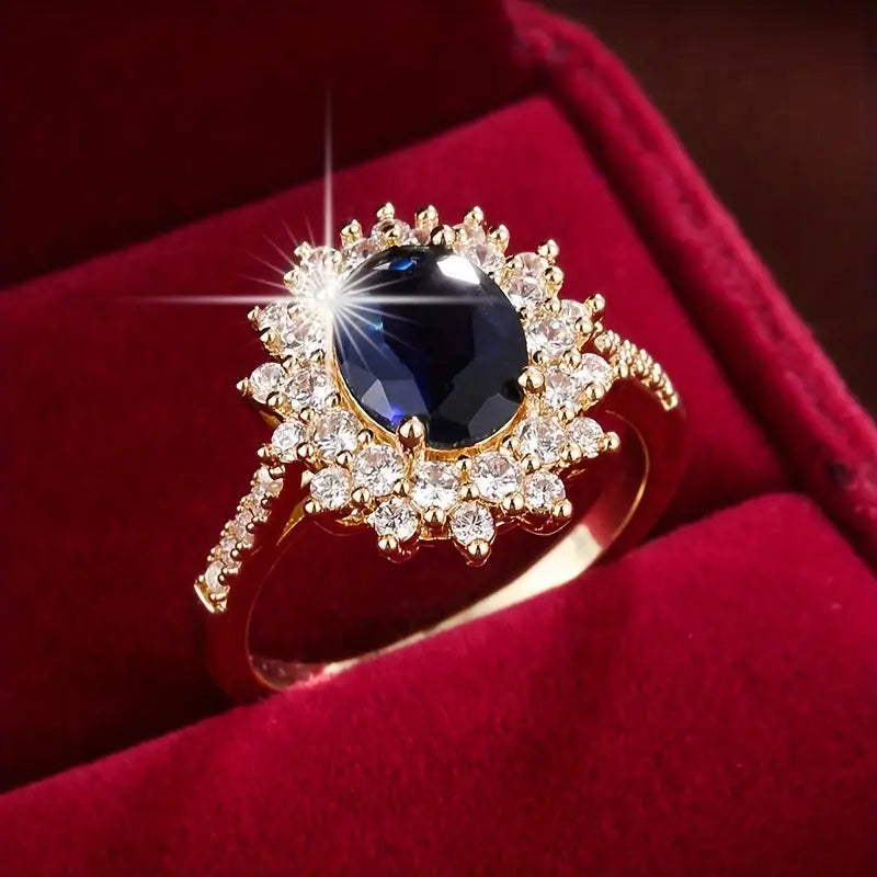 Delphine – Stilvoller goldener Ring mit blauer Stein