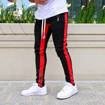 Herren Jogginghose mit Kontraststreifen, Reißverschlusstaschen und tapered Schnitt