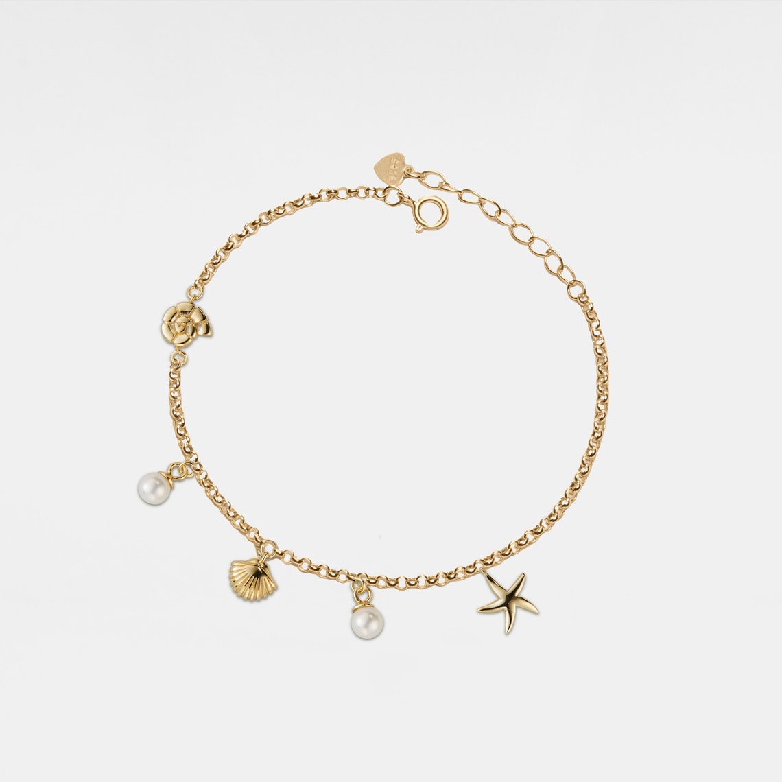 Armband mit Muschel- und Seestern-Anhängern
