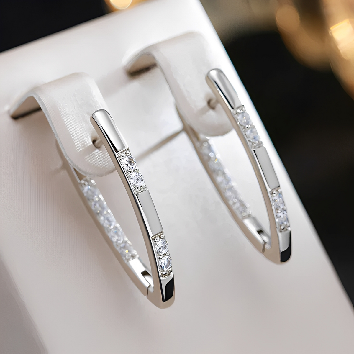 Cleah – Elegante Ohrringe mit goldenem Zirkonia