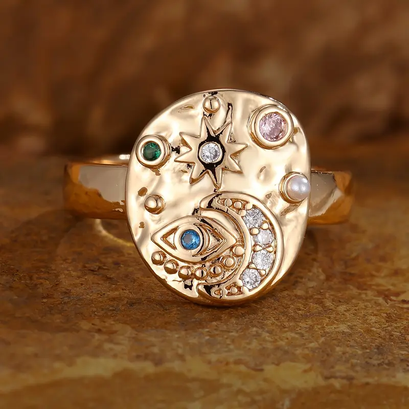 Solenya – Kristallring in Gold mit Sonnen-Mond-Design