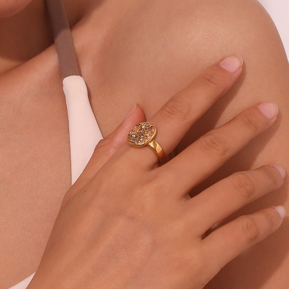 Solenya – Kristallring in Gold mit Sonnen-Mond-Design
