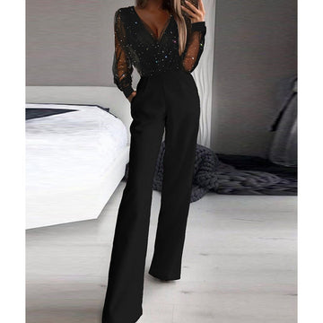 Kaye – Einteiler mit tiefem Ausschnitt und lockerer Hose